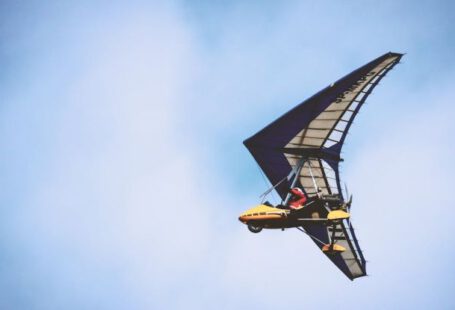 Hang Glider - Yellow and Black Plane Under Blue Clouds