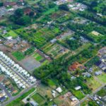 City Parks - An aerial view of a small town with green trees