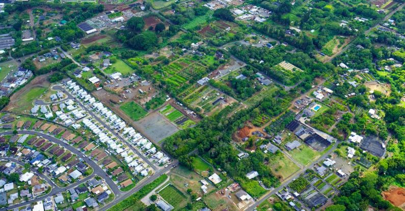 City Parks - An aerial view of a small town with green trees