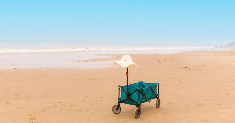Beach Retreats - A Sun Hat on a Beach Cart
